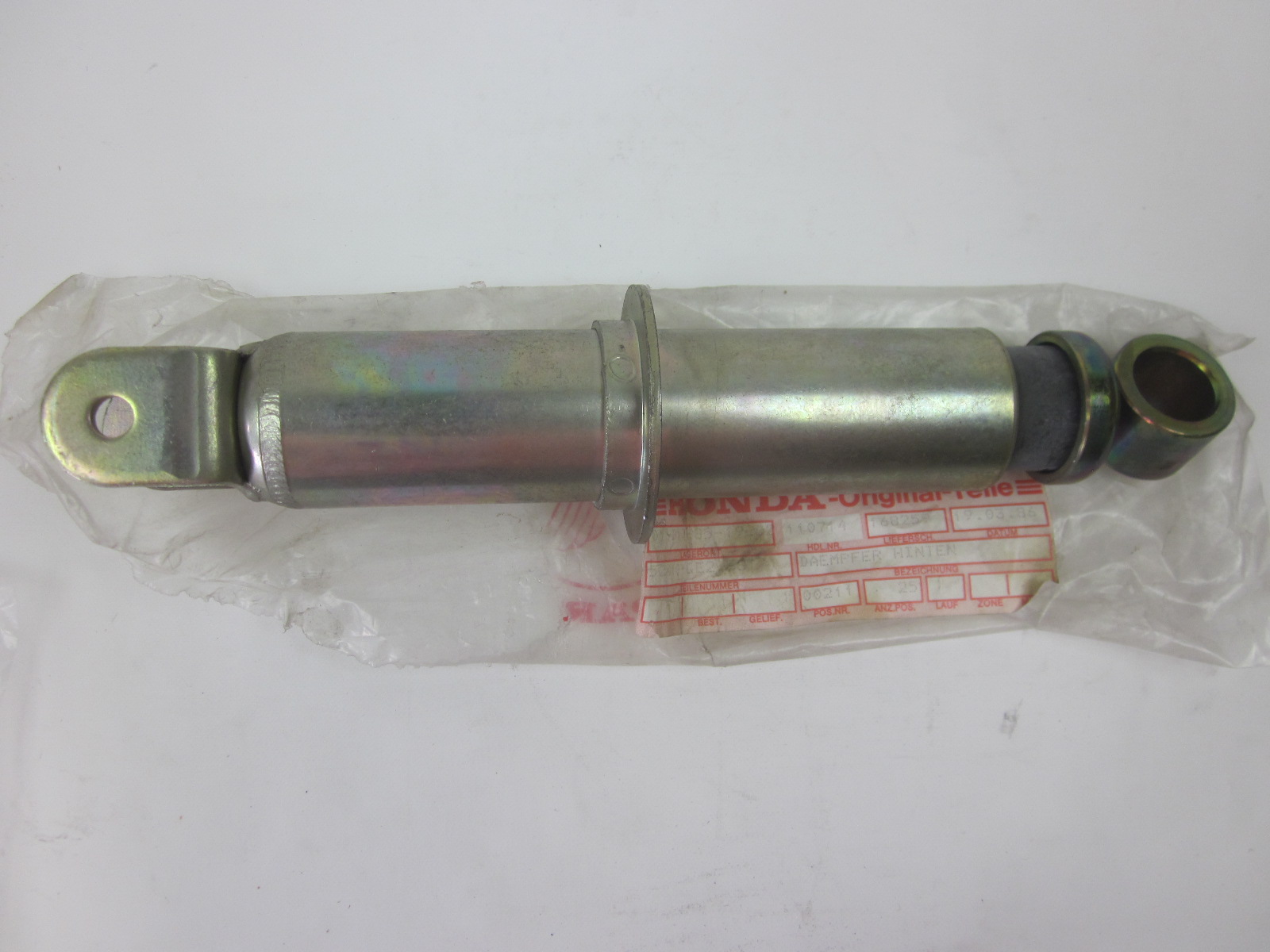 Picture of DAEMPFER HINTEN  52410-GE2-681  NSR 50 F 