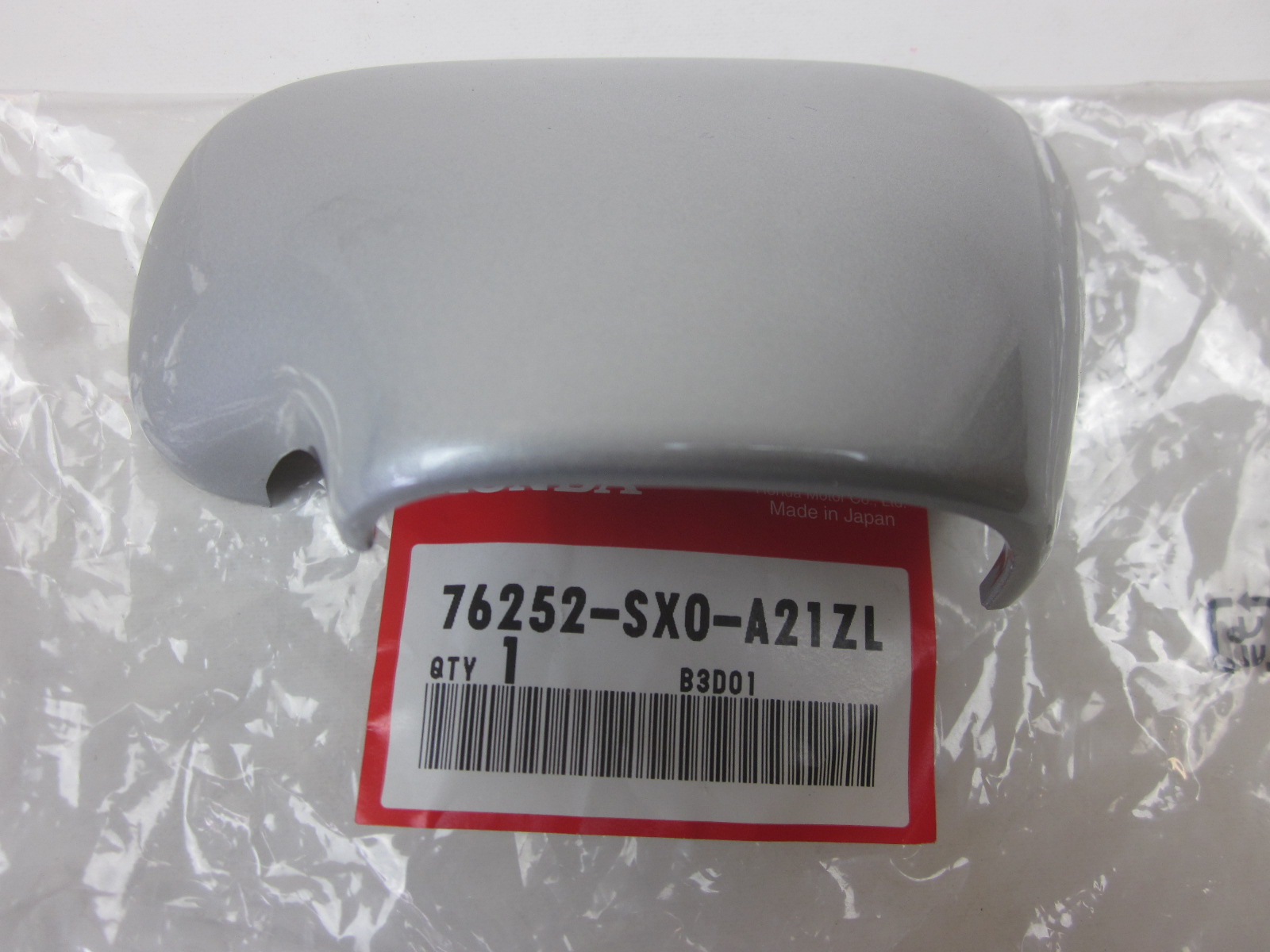 Picture of ABDECKUNG, L. SOCKEL  76252-SX0-A21ZL  SHUTTLE